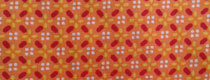 tissu orange à motifs géomètriques rouge, jaune et blanc